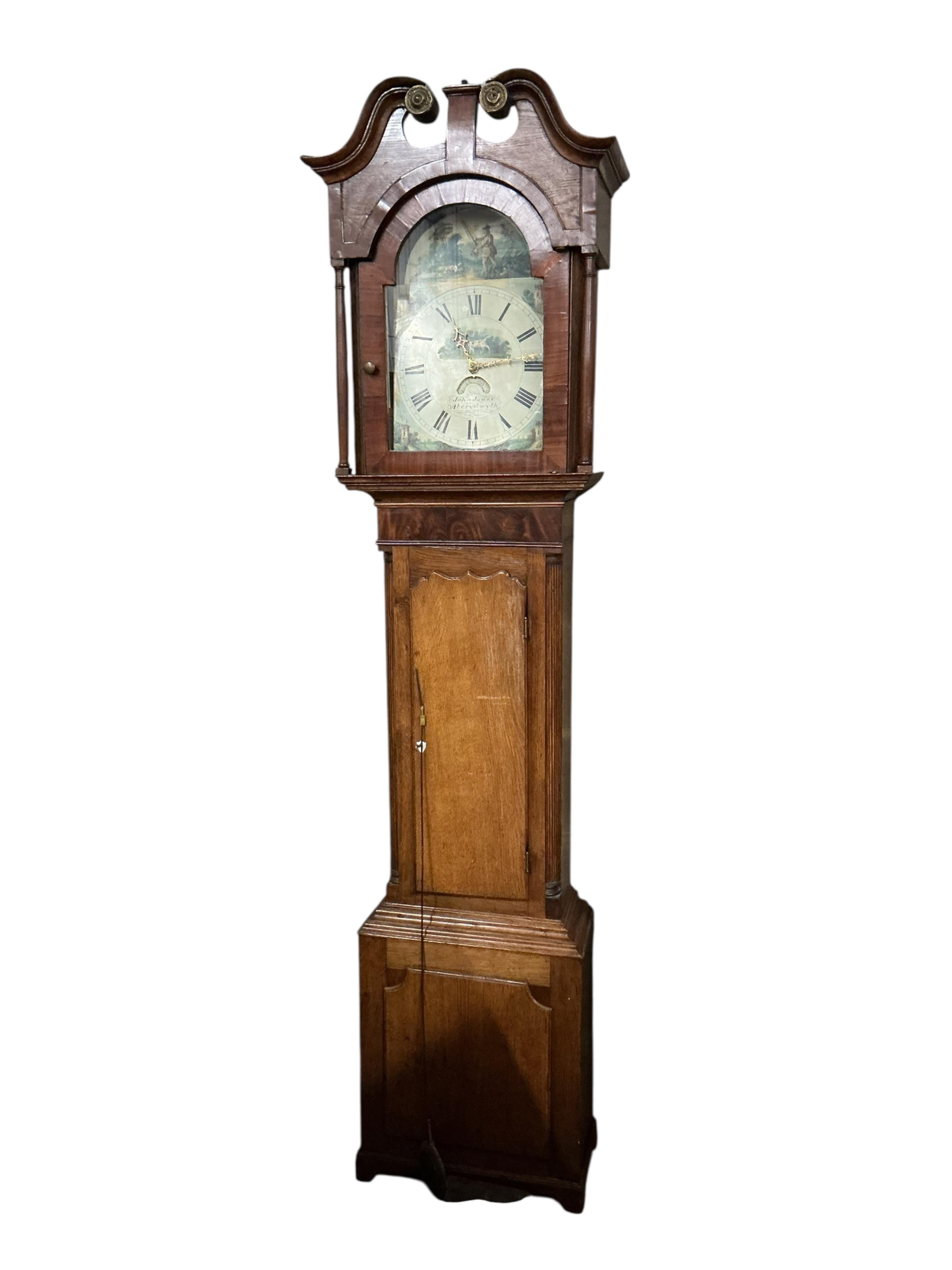 An early 19th century oak and mahogany thirty hour longcase clock, dial signed John Jones, Aberystwyth, height 210cm